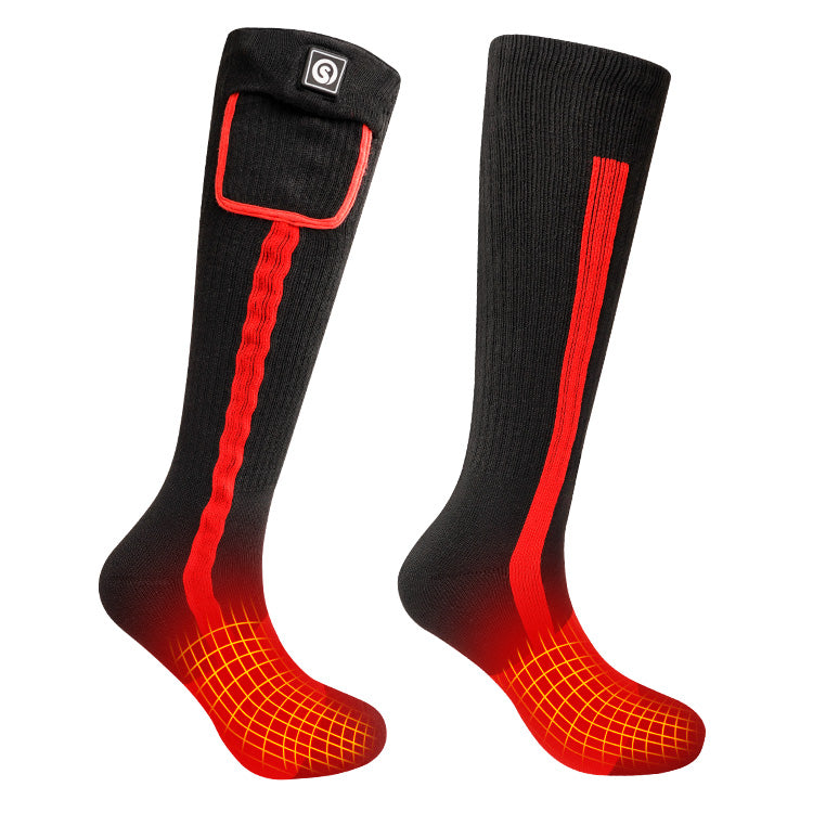 Black heated socks with ribbed knit texture, red contrast panels, battery pocket near the cuff, and illustrated heat at the toes.