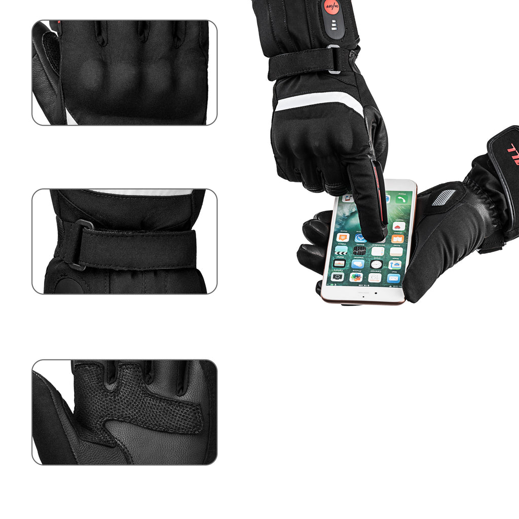 Heated motorcycle glove showing touchscreen fingertip, wrist strap adjustment, and reinforced palm grip while operating a smartphone.