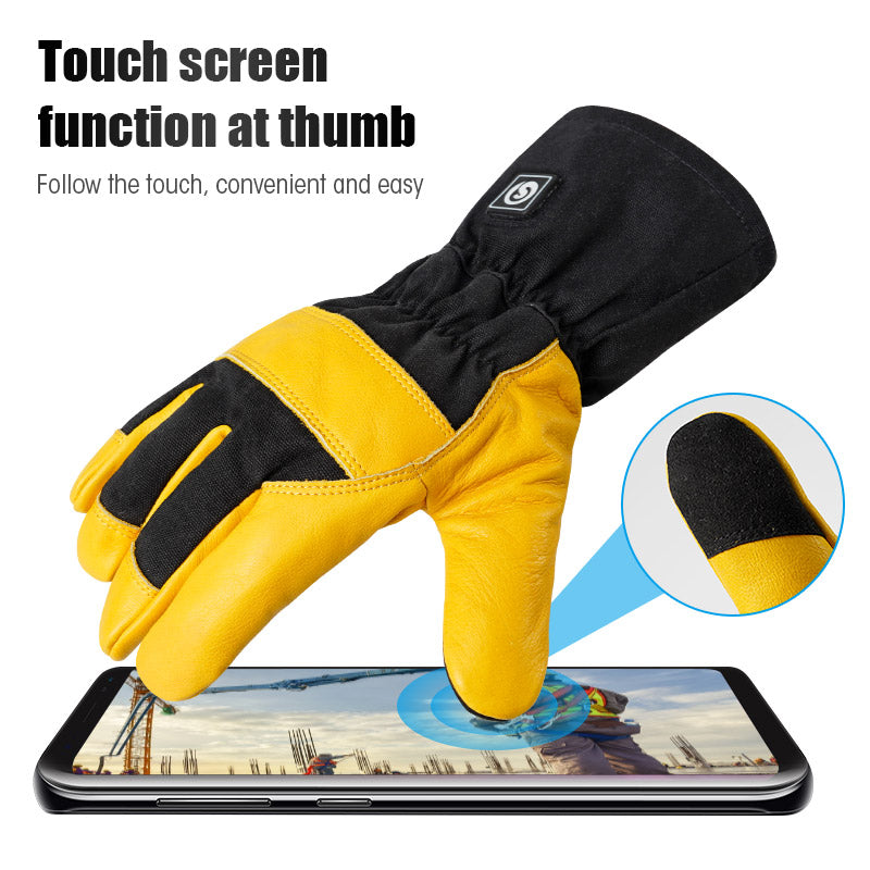 Yellow leather heated work gloves with a touchscreen thumb touching a smartphone screen.