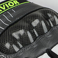 Close-up of a reinforced knuckle protective shell on heated motorcycle gloves.