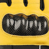 Close-up of reinforced motorcycle glove knuckle protection with a glossy impact-resistant shield.