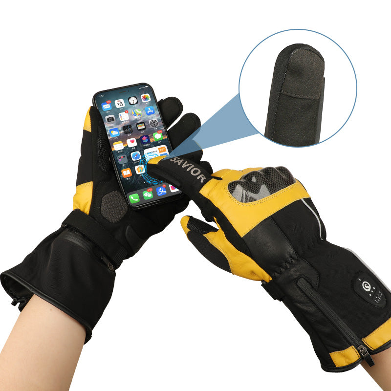 SAVIOR HEAT heated motorcycle gloves with touchscreen fingertips, allowing users to operate a smartphone while wearing insulated heated gloves.