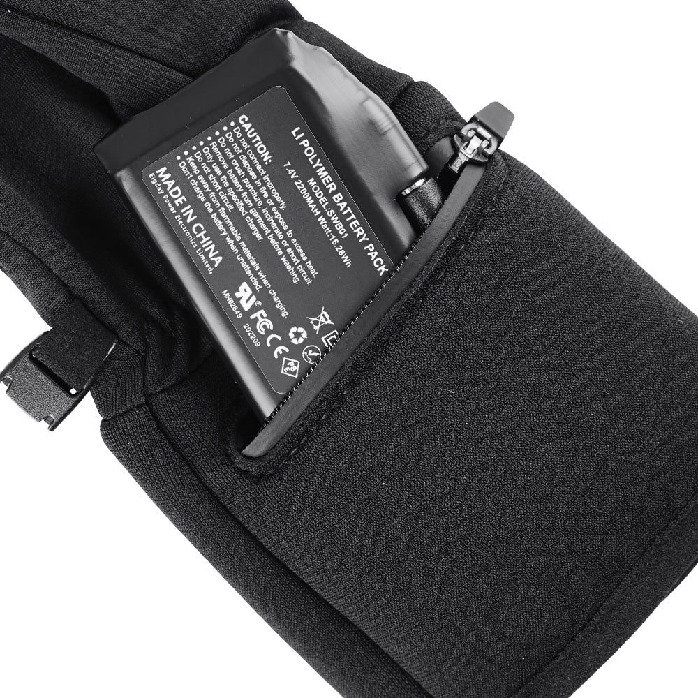 Rechargeable heated gloves battery pack inside waterproof zipper pocket, showing long-lasting 7.4V lithium battery for SAVIOR HEAT heated gloves used for skiing, motorcycling, ice fishing and winter work.