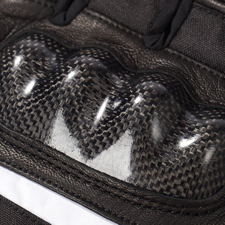 Close-up view of the reinforced protective knuckle shell on motorcycle heated gloves.