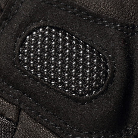 Close-up of reinforced anti-slip panel on motorcycle heated gloves for better grip control.