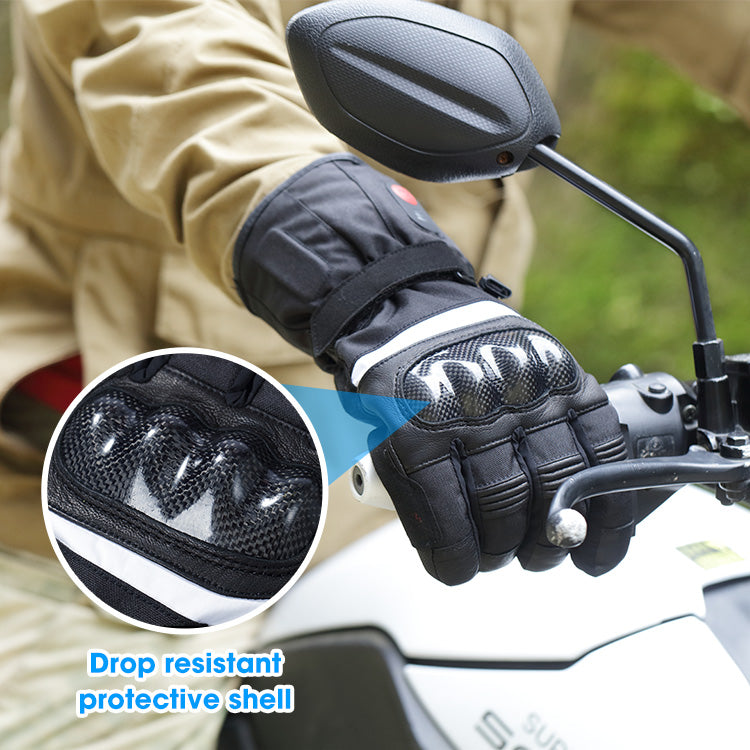 Heated motorcycle glove with a reinforced protective shell holding the handlebar during outdoor riding.