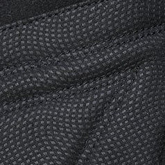Close-up of textured black grip material on heated gloves, showing durable anti-slip pattern for better control in winter conditions.