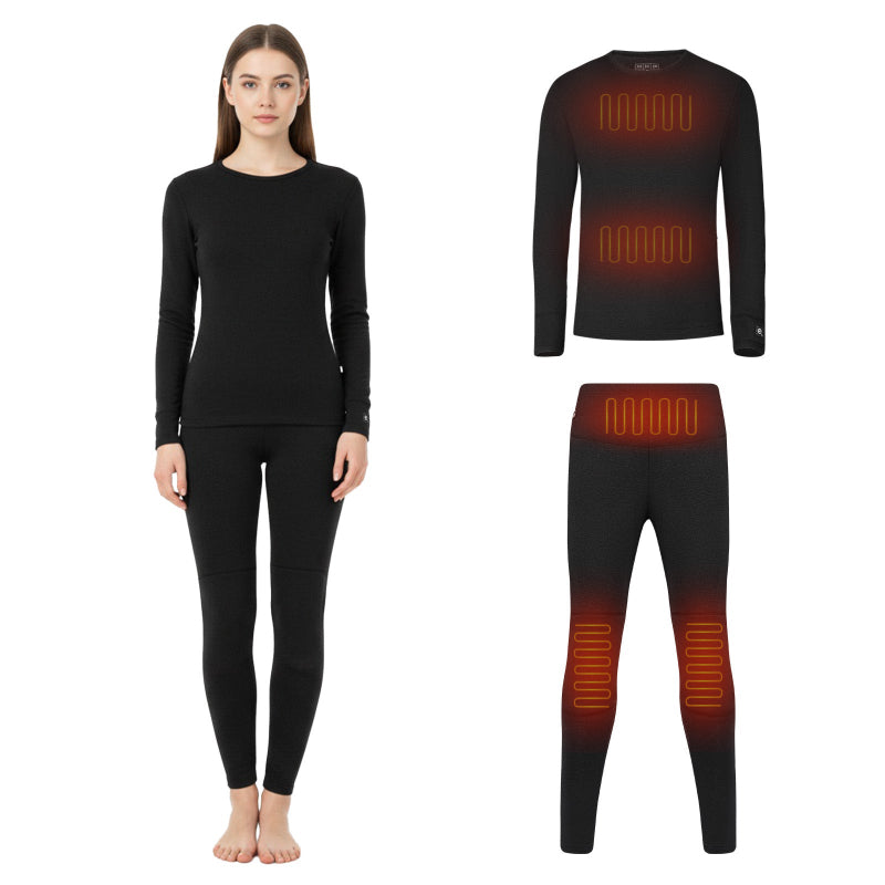Black heated base layer set on a female model, with diagrams illustrating heat zones on chest, waist, and knees.