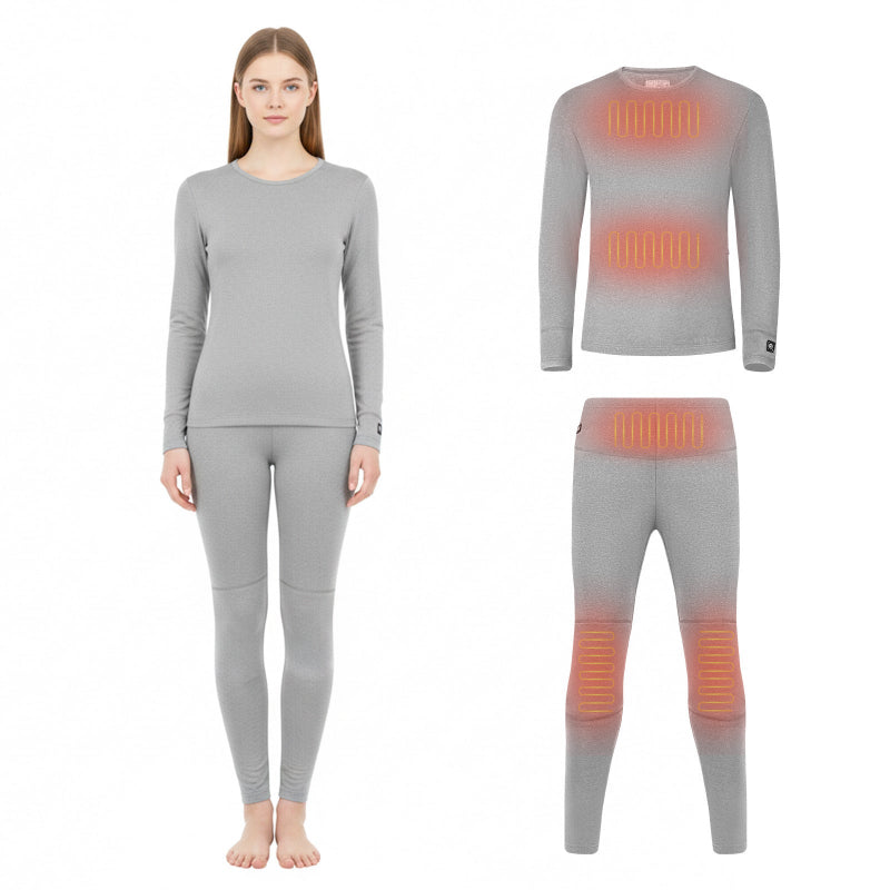 Gray heated base layer set on a female model, with diagrams showing heat zones on chest, waist, and knees.
