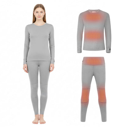 Gray heated base layer set on a female model, with diagrams showing heat zones on chest, waist, and knees.