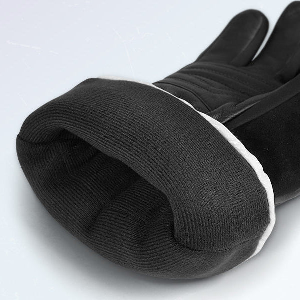 Close-up of winter glove cuff showing soft ribbed knit interior designed for warmth, comfort, and a secure seal against cold air during outdoor activities.
