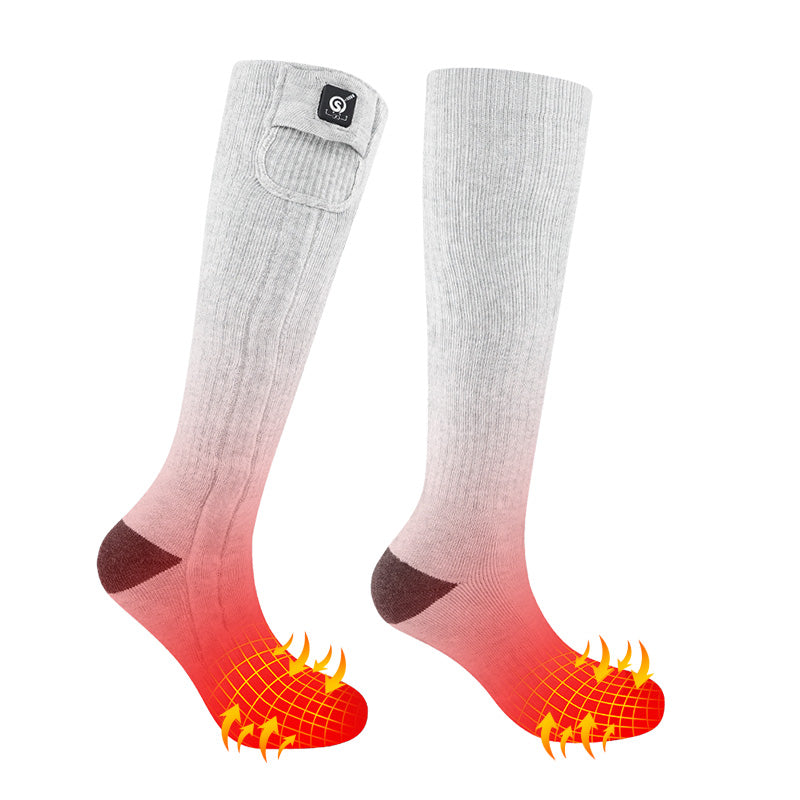 Light gray heated socks with ribbed knit texture, visible battery pocket near the cuff, and illustrated heat effect glowing at the toe area on a white background.