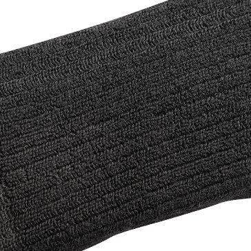 Close-up of black knit fabric showing soft, elastic material texture used in heated socks.