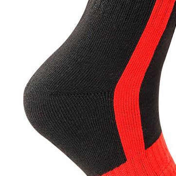 Close-up of a black and red knit sock showing the heel area and ribbed fabric texture